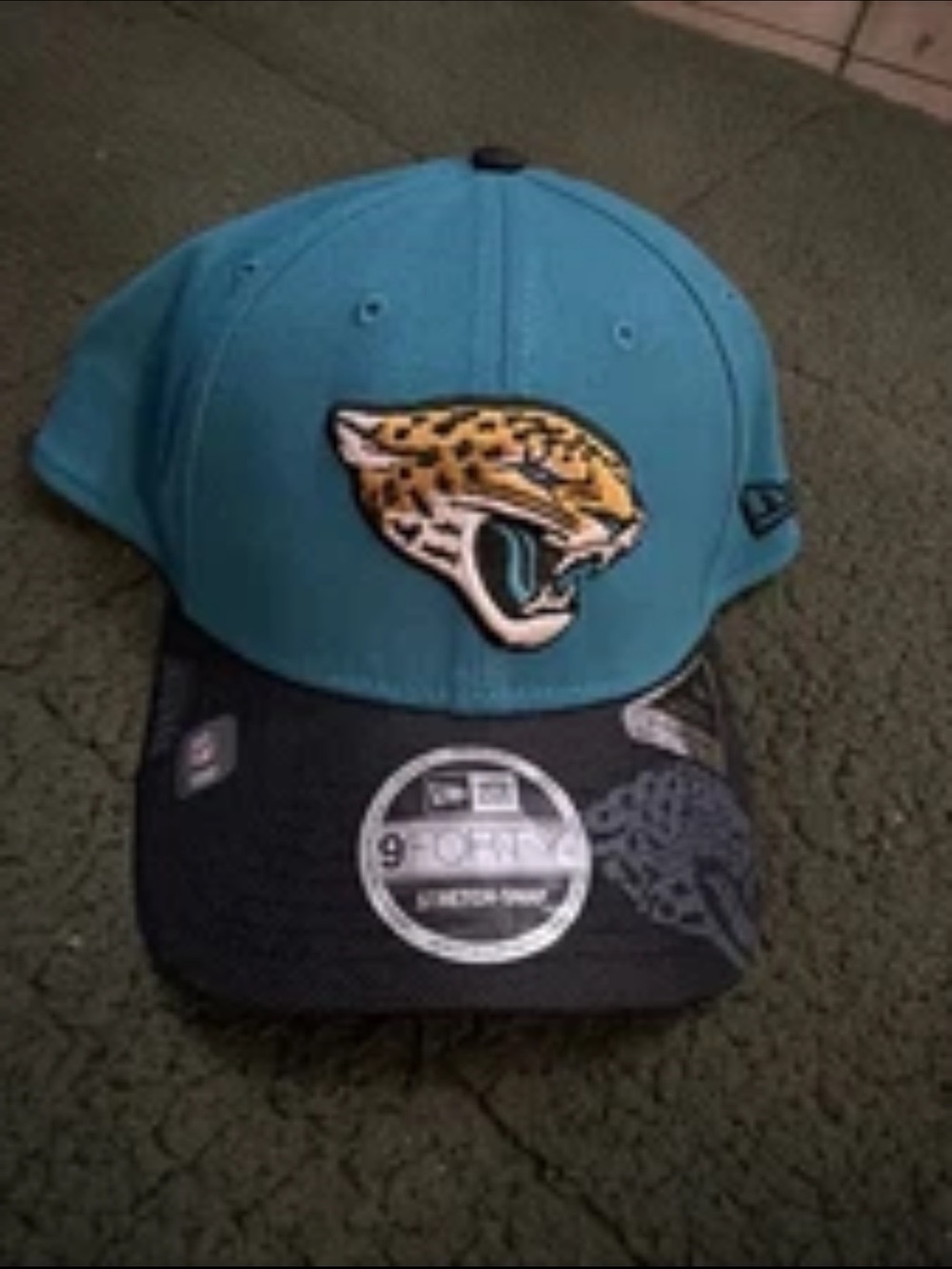 New Era Jaguars 9 Forty Teal Crown Black Visor Snapback Hat